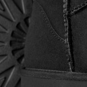 UGG Women's Classic Mini II Boot in Black — suede and stitching detail