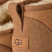UGG Women's Classic Ultra Mini Boot in Chestnut — heel pull-tab and UGG label detail