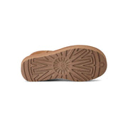 Outsole of the UGG Women's Classic Ultra Mini Platform Boot in Chestnut showing the tan sunburst tread