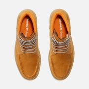 Timberland Men's Redwood Falls Waterproof Moc-Toe Boot in Wheat, top-down view of the pair showing orange Ortholite footbeds