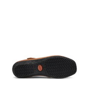 Taos Women's Banter flat in caramel, outsole view showing the chevron tread